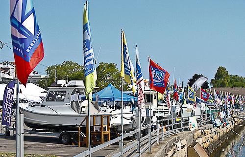 Boats on exhibit on the seawall in Rockland Harbor