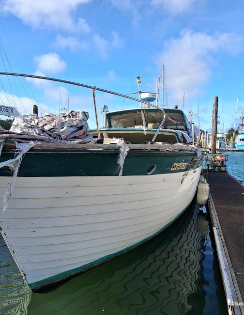 Chris Craft Sea Skiff 42', in wtaer docked bow portside view