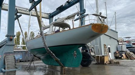 41' K Aage Nielsen sloop 324-A BUTTERFLY, suspended on lift full keel view stern port side