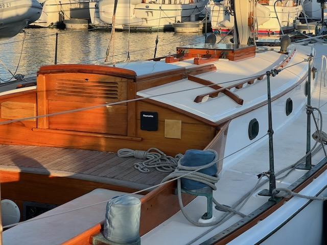 "MERRYWING" A 39' sloop, from dock starboard side, looking at cabin