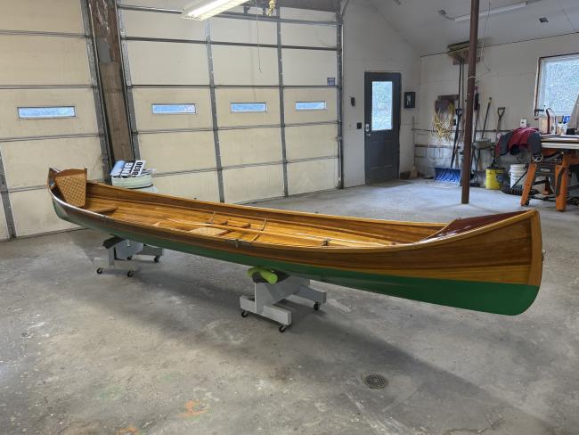 New Adirondack Guide Boat for Sale, on stands, inside 1